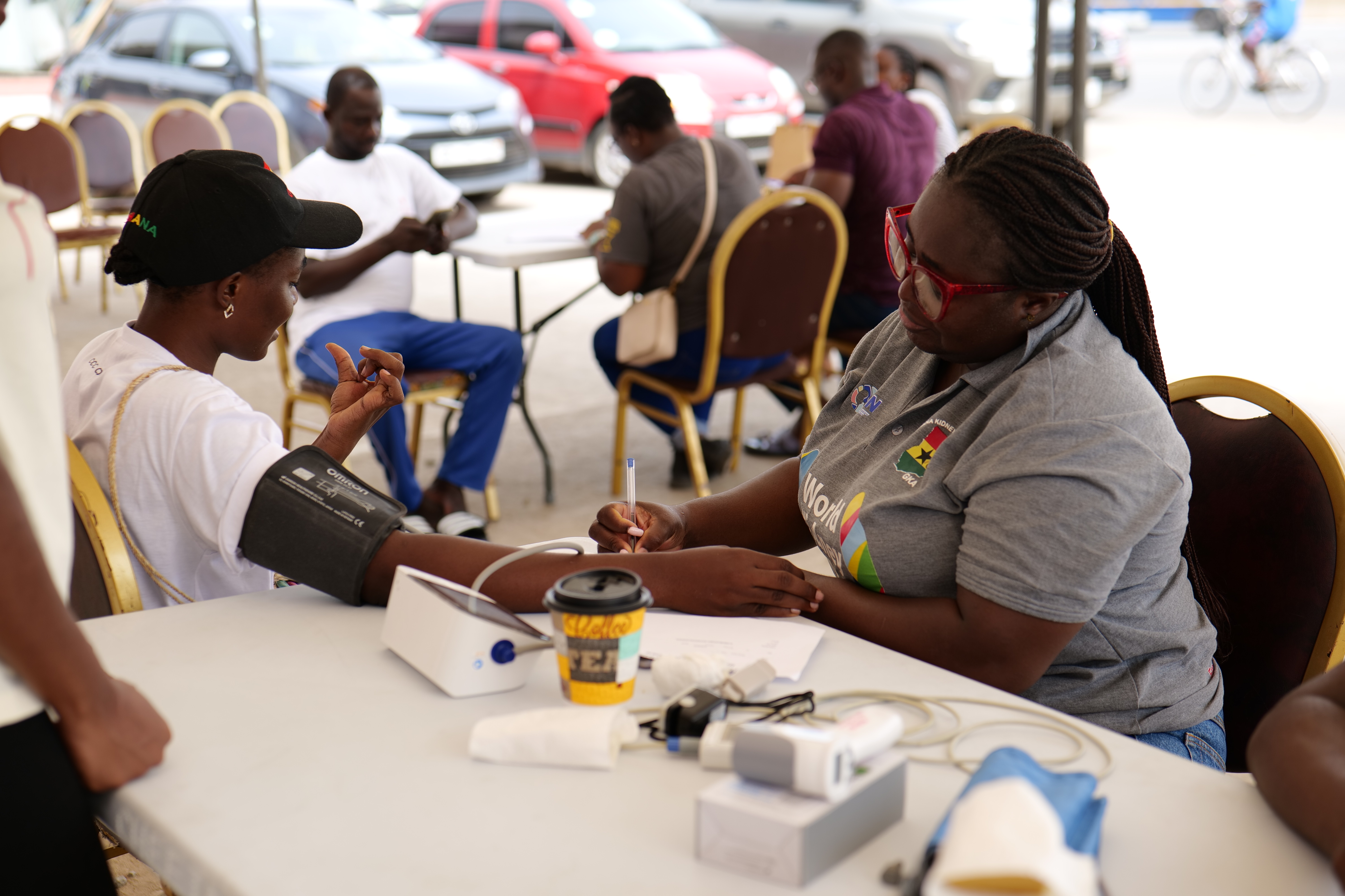 Volunteers assisting patients