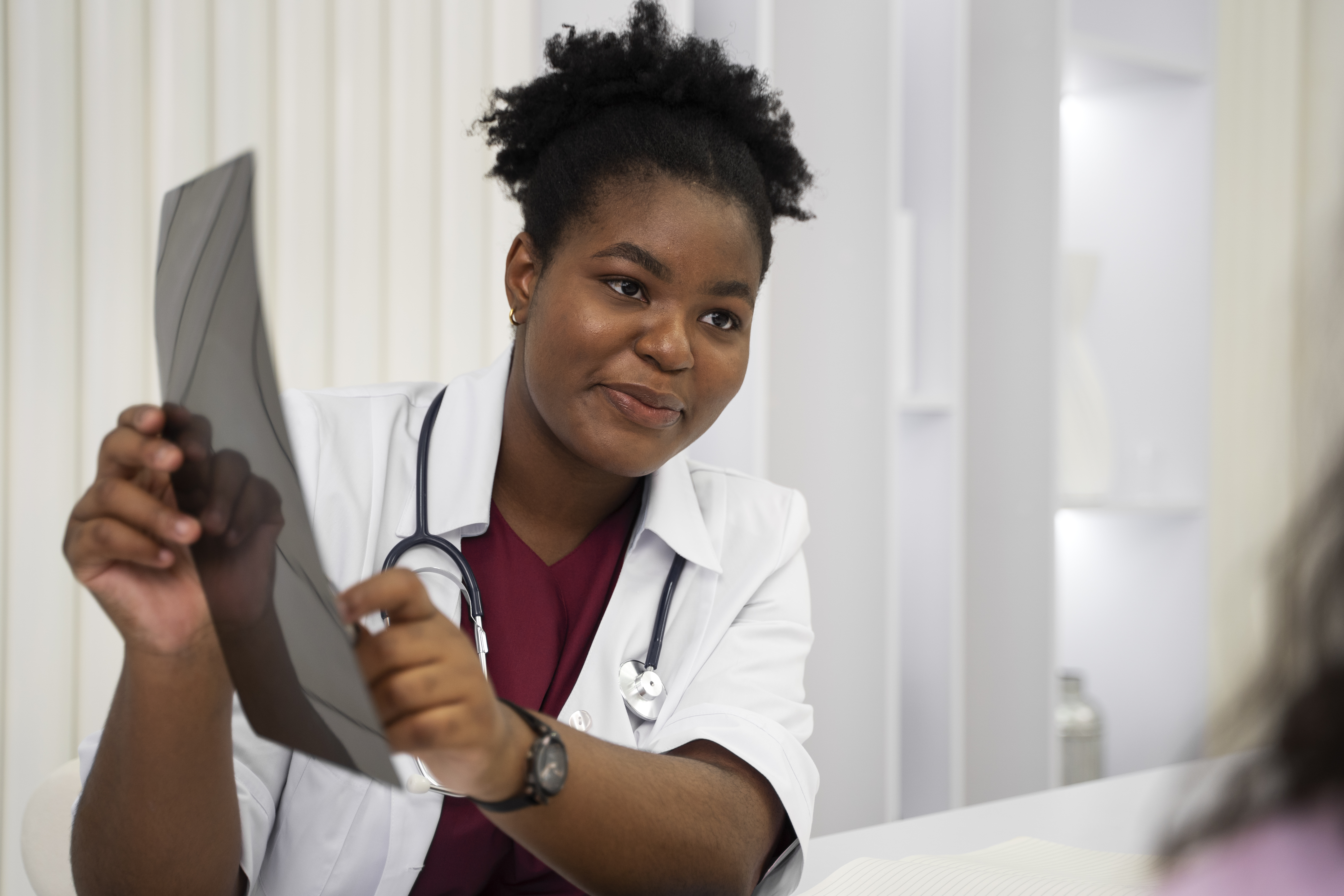 Medical professional reviewing results